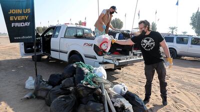 Volunteers from the Offroaders.ae driving club filled 100 bags of rubbish, mainly plastic waste, during a desert clean-up.