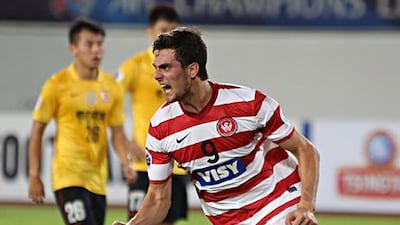 Tomi Juric of Western Sydney Wanderers celebrates scoring a goal during their Asian Champions League quarter-final match against Guangzhou Evergrande in Guangzhou. Zhong Zhi / Getty Images