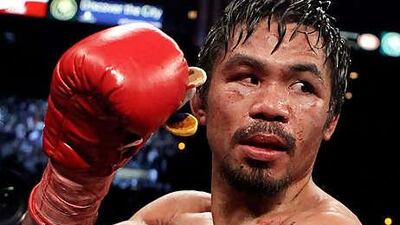 Margarito is expected to face Pacquiao, above, for a junior middleweight title on November 13.