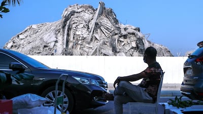 Helal Miah, from Bangladesh, waits for customers at stall Number 34. Shops will remain open during the redevelopment.