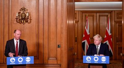 England's chief medical officer for England Chris Whitty, alongside Boris Johnson, doubted new lockdown measures would be enough to contain the second wave. AFP