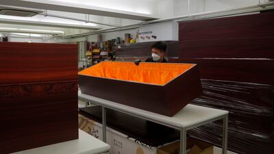 LifeArt Asia's cardboard coffins are made of recycled wood fibre that can be customised with designs on the exterior and the company can make up to 50 coffins a day.