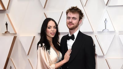 Claudia Sulewski and Finneas O'Connell arrive at the Oscars on Sunday, February 9, 2020, at the Dolby Theatre in Los Angeles. AP