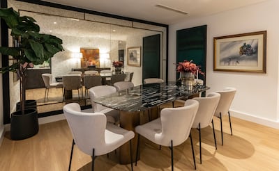 The stylish dining area at the three-bedroom property. Chris Whiteoak / The National