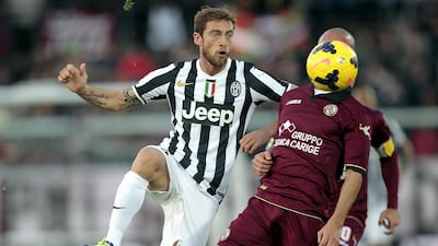 Marchisio fights for the ball during the Serie A match against Livorno in 2013. Getty Images