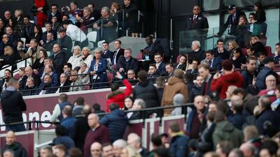 West Ham United fans remonstrate with co chairman David Sullivan and vice chairman Karren Brady in the stands. David Klein / Reuters
