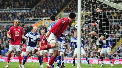 Paul Scharner of West Bromich Albion heads to score the third goal, one that just dipped over the goal line. Shaun Botterill / Getty Images