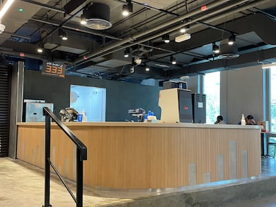 The upstairs seating area of Al Baik features a counter for soft drinks and sauces. Photo: Janice Rodrigues