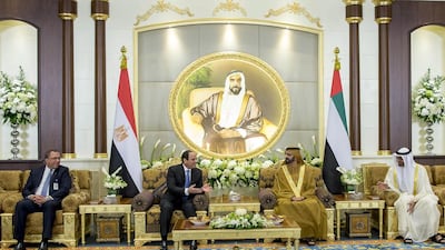 Sheikh Mohammed bin Rashid, Vice President and Ruler of Dubai, Sheikh Mohammed bin Zayed, Crown Prince of Abu Dhabi and Deputy Supreme Commander of the Armed Forces, and Sheikh Tahnoon bin Zayed, Deputy National Security Adviser, welcome Egyptian president Abdel Fattah El Sisi at Al Mushrif Palace in Abu Dhabi. AFP