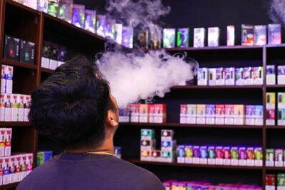 It is illegal to sell vapes and e-cigarettes to under-18s in the UAE. Victor Besa / The National