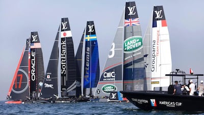 (From left to right) Emirates Team New Zealand skippered by Glenn Ashby, Oracle Team USA skippered by Jimmy Spithill, Softbank Team Japan skippered by Dean Barker, Aretmis Racing skippered by Nathan Outteridge, Land Rover BAR skippered by Ben Ainslie and Groupama Team France skippered by Adam Minoprio compete in the first day of the 35th America's Cup World Series in Oman on February 27, 2016 off the coast of the capital Muscat. FLORIAN CHOBLET / AFP