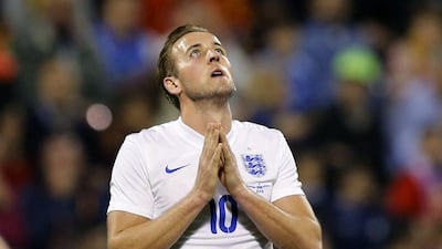 Harry Kane reacts after missing a scoring chance. Juan Carlos Cardenas / EPA