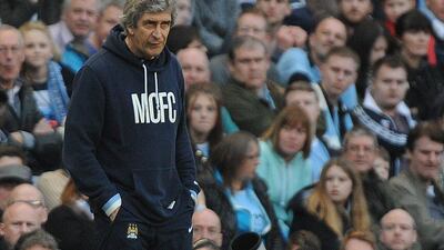 Manchester City could still win trophies from two more competitions despite exiting the FA Cup on Sunday. Peter Powell / EPA / March 9, 2014