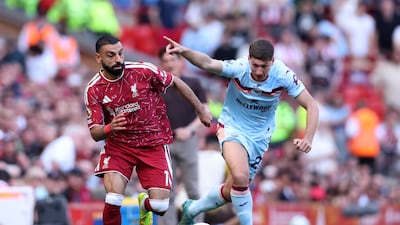 Mohamed Salah vies for the ball with Vitaly Janelt of Brentford. Getty Images