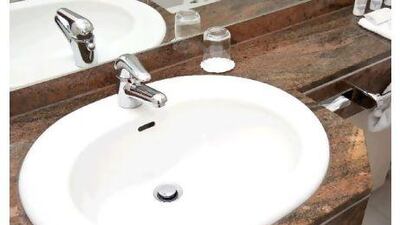 Look for sinks and pipes that are properly sealed and free from leaks. iStockphoto