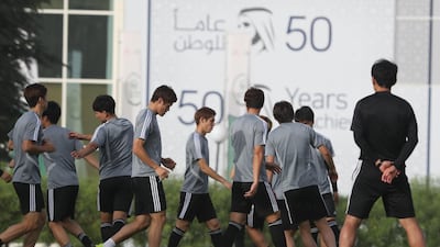Japan take part in a training session in Abu Dhabi on the eve of their Asian Cup quarter-final match against Vietnam. All photos by Karim Sahib / AFP