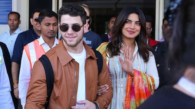 Priyanka Chopra, right, and Nick Jonas, left, arrive in Jodhpur in the western Indian state of Rajasthan. Chopra and Jonas are set to be married in a series of ceremonies in Jodhpur. Sunil Verma / AFP