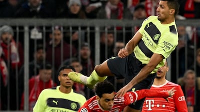 Manchester City midfielder Rodri wins an aerial duel with Bayern Munich's Jamal Musiala. AFP