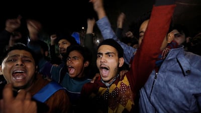 Demonstrators shout slogans during a protest against a new citizenship law, outside the police headquarters in New Delhi, India, December 16, 2019. REUTERS/Adnan Abidi