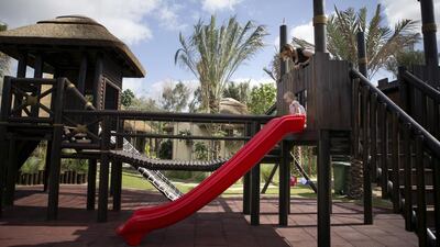Emily Carpenter plays with her daughter Betsy, 2, at The Journey, which opened last month, and has already welcomed more than 5,000 children. Reem Mohammed / The National