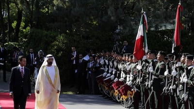 Sheikh Mohammed inspects the guard of honour with Mexican President, Enrique Peña Nieto. Henry Romero / Reuters