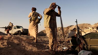Yemeni government fighters on the front lines during fighting against Houthi fighters in Marib. Reuters