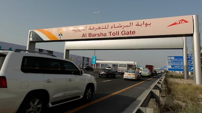 The Al Barsha Toll Gate along Sheikh Zayed Road in Dubai is part of a system that Abu Dhabi may follow Jeffrey E Biteng / The National