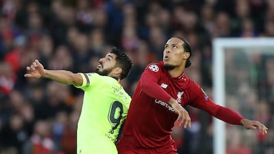 Virgil van Dijk: 8/10: A colossus at the back. Luis Suarez hardly got a look in. Almost scored with an outrageous back-heel from a corner. Reuters