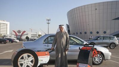 Alawi Alsaqqaf, the vice chairman of Ibex Car Care, says their in-house developed trolleys consume only two litres per wash. Mona Al Marzooqi / The National