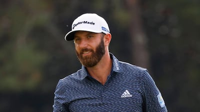 Dustin Johnson celebrates on the 18th green after winning The Masters. Reuters