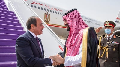 Saudi Arabia's Crown Prince Mohammed bin Salman greets Egyptian President Abdel Fattah El Sisi on his arrival in Riyadh. SPA