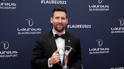 Argentinian soccer player Lionel Messi poses with Laureus World Sportsman of the Year Award in Paris on May 8. EPA
