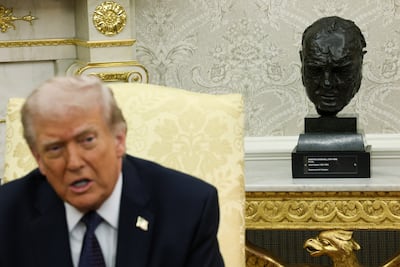 A bust of former UK Prime Minister Sir Winston Churchill sits in the Oval Office. AFP