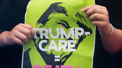 Opposition to President Donald Trump's attempts to repeal his predecessor's affordable health care act have led to deep fissures in American society EPA/MICHAEL REYNOLDS