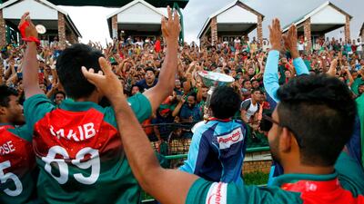 The Bangladesh cricket team celebrate with supporters after beating India to win the Under-19 World Cup at Senwes Park, in Potchefstroom, South Africa, on Sunday, February 9. AFP