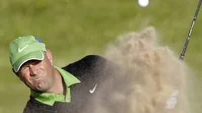 Stewart Cink splashes out of a bunker in the Open play-off.