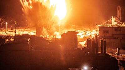 An Israeli strike hits the Ansar camp for displaced Palestinians, in western Gaza city. EPA