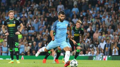 Sergio Aguero scores his second goal for Manchester City against Borussia Monchengladbach in their Uefa Champions League group game at Etihad Stadium. Alex Livesey / Getty Images