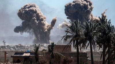Heavy smoke rises above the last remaining position of ISIS in the village of Baghouz during battles with the Syrian Democratic Forces. AFP