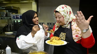 Amina El Shafei, right, with the chef Khulood Atiq in Abu Dhabi. Courtesy Abu Dhabi Tourism & Culture Authority