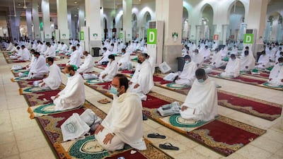 Muslim pilgrims attending prayers. AFP