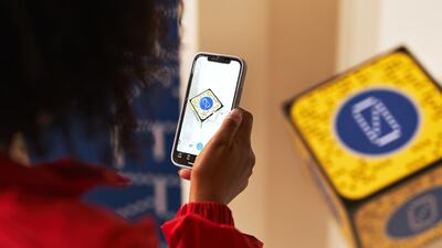 A Snapchat filter allows visitors to 'try on' sneakers at the new exhibition in London.