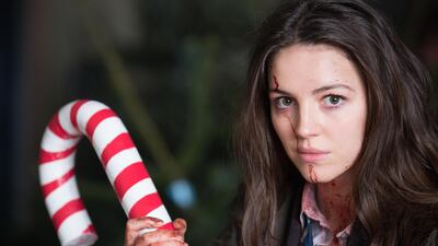Ella Hunt as Anna decapitates zombies with a candy cane. Courtesy Front Row Filmed Entertainment