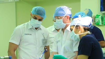 Doctors carry out brain surgery on Salha Al Dhaheri, who was awake during the procedure. Courtesy: Cleveland Clinic Abu Dhabi