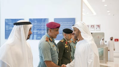 Sheikh Mohammed bin Zayed greets Maj Gen Mohamed Khalfan Al Romaithi, Commander in Chief of Abu Dhabi Police and Head of Security, Justice, Health and Safety Committee of Abu Dhabi Executive Council. Rashed Al Mansoori / Crown Prince Court - Abu Dhabi