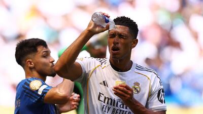 Real Madrid's Jude Bellingham pours water on his face to cool down during a break in play during the group phase match against Al Hilal at Hard Rock Stadium in Florida. Reuters