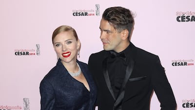 Scarlett Johansson, in Dior, and Romain Dauriac arrive for the 39th Cesar Film Awards at Theatre du Chatelet on February 28, 2014 in Paris, France. Getty Images