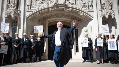 On Monday, former Tory MP Jerry Hayes joined fellow criminal defence barristers on picket lines outside the Supreme Court, Westminster, to support the ongoing Criminal Bar Association action over government set fees for legal aid advocacy work. PA