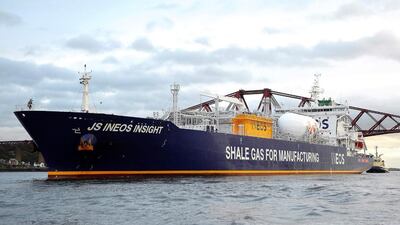 A bagpiper plays from the prow of the JS Ineon Insight. The carrier, transporting 27,500 cubic metres of ethane, was given a traditional Scottish welcome. Andy Buchanan / AFP