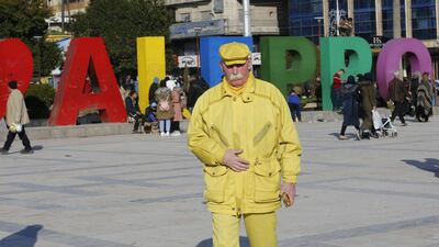Zakkour walks in the central Saadallah al-Jabiri square